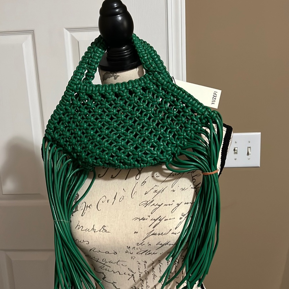 YUZEFI mini woven basket bag in the color apple